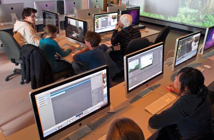 A group of students working in a computer lab.